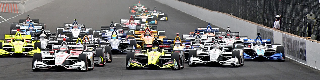 indy cars racing to through the start line Milwaukee