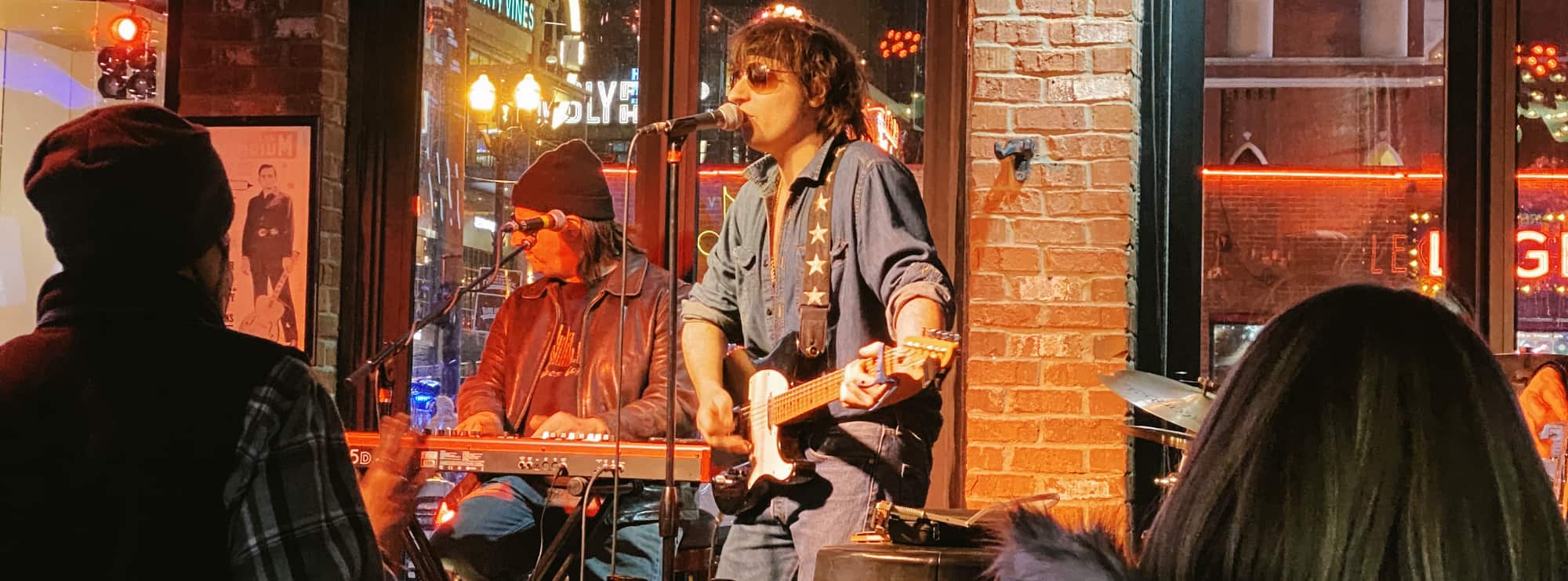 bar singer on guitar in Milwaukee